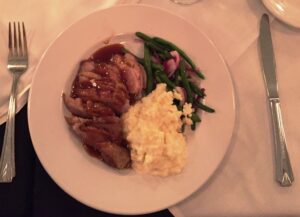 Duck breast served with parmesan risotto and green beans at the Diamond Grill